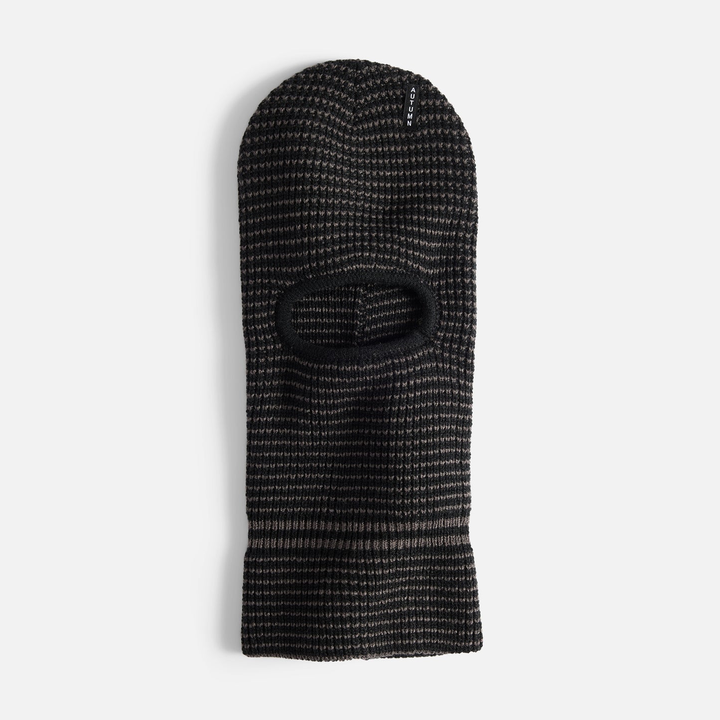 Striped Mask in black by Autumn Headwear